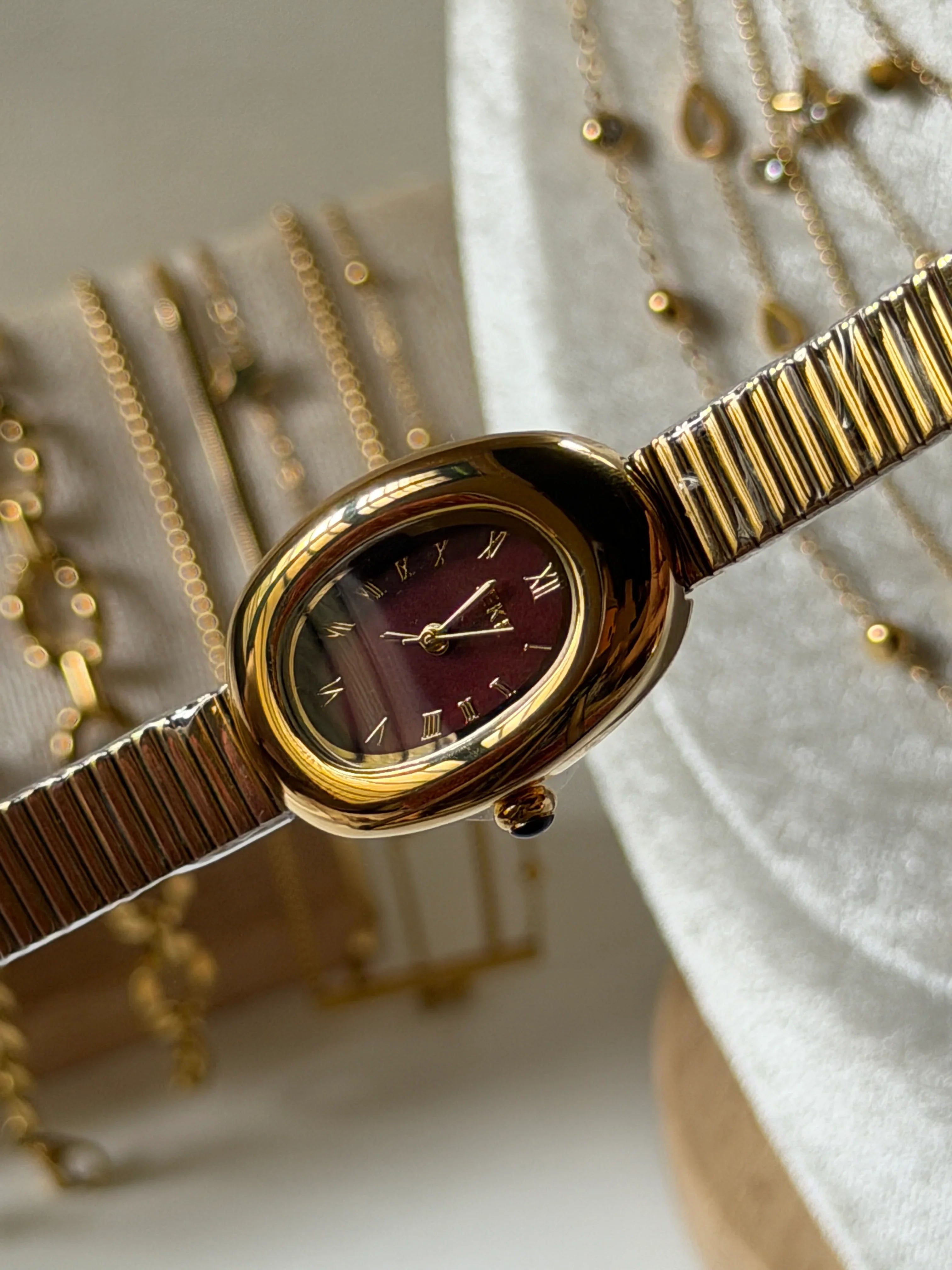 Aurel cherry Luxe vintage watch stack